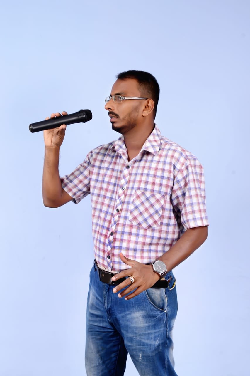 Amila Indika Weligepola performing with a microphone